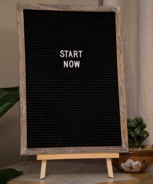 Wooden framed board with 'Start Now' message for motivation and inspiration.